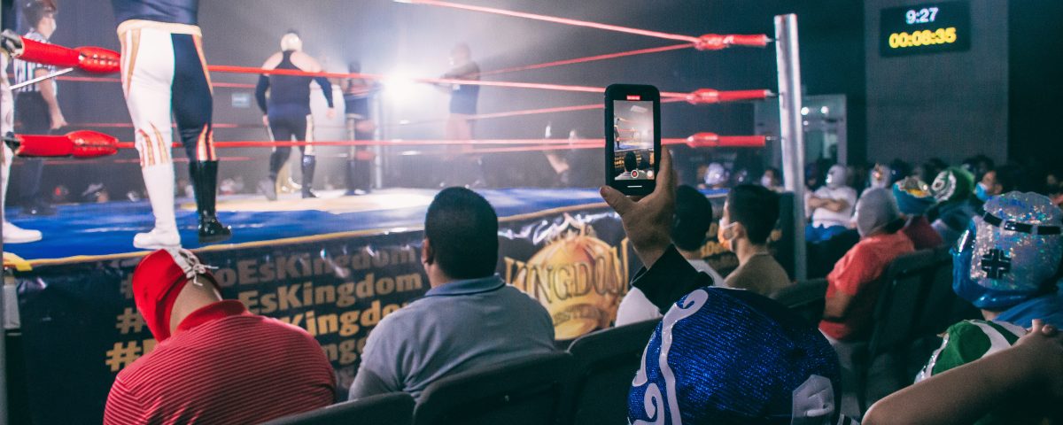 A boxing ring with spectators.