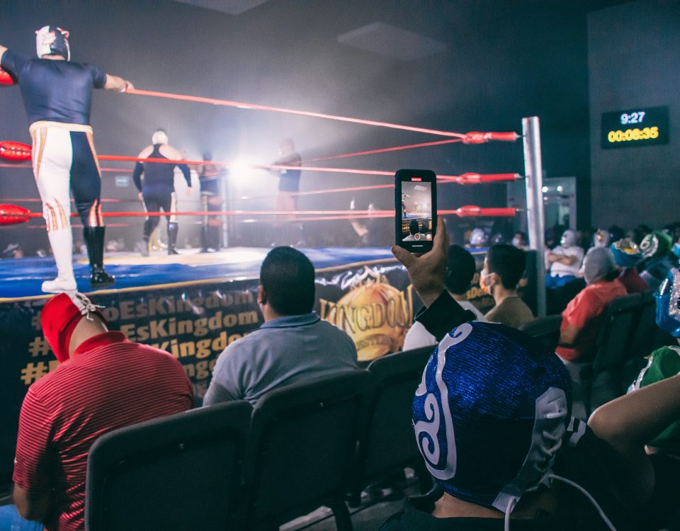 A boxing ring with spectators.